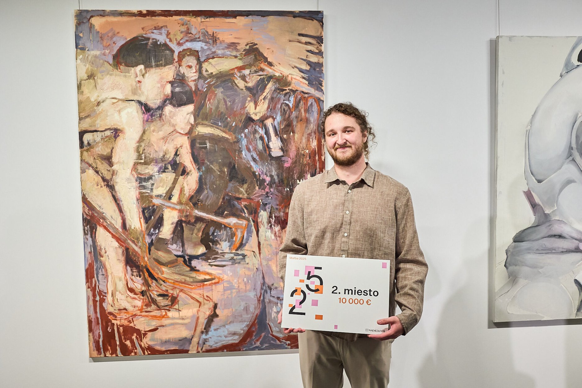 Adam Baník pri preberaní ceny